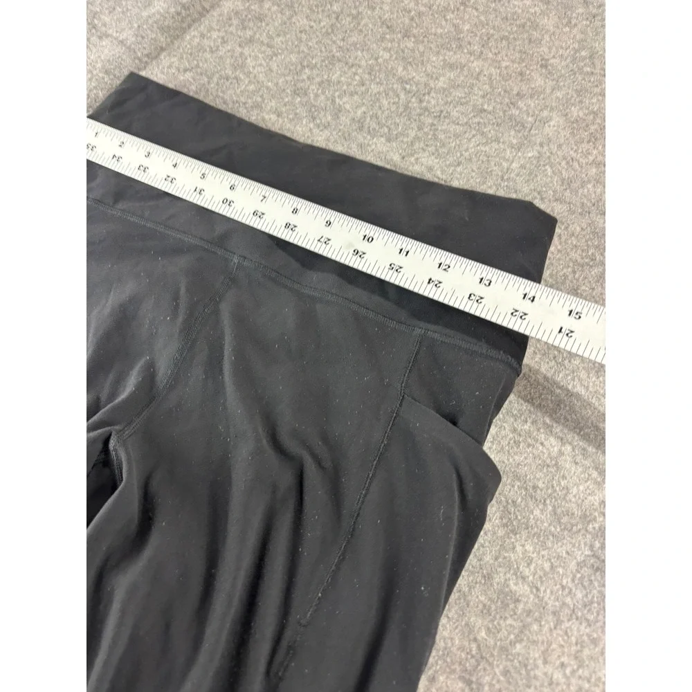 Athleta Salutation Stash Pocket II Tight Black Leggings Powervita Womens M Gym